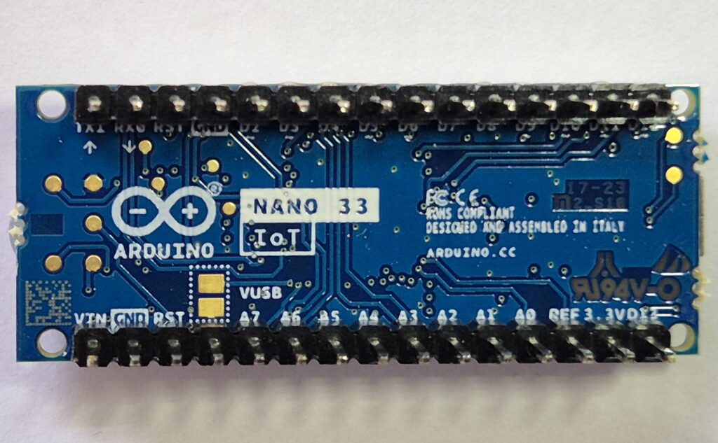 Close-up of Arduino Nano 33 IoT on the silk-screened side identifying what each pin is