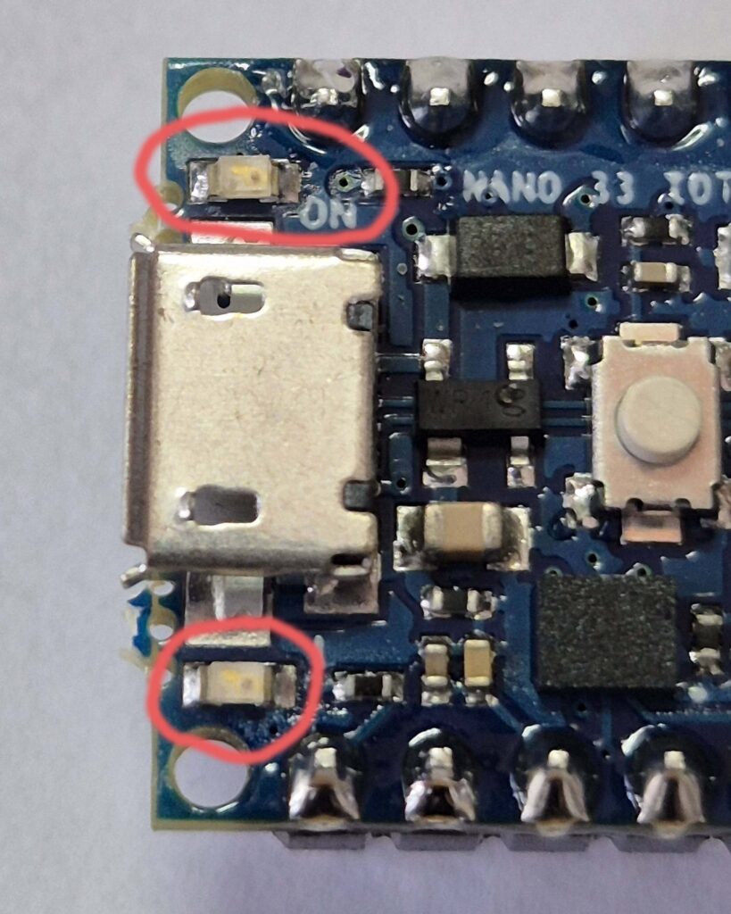 Close up showing the two LED's, one either side of the USB socket on the Nano 33 IoT board