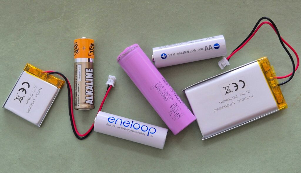 A selection of different batteries, mostly rechargeable